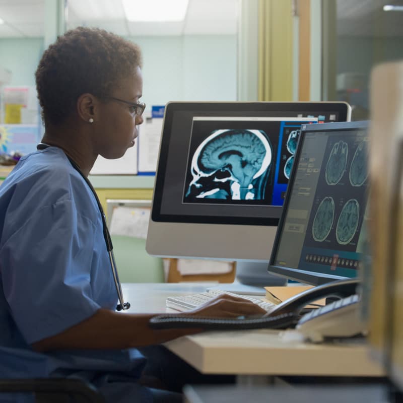 Doctor examining x-rays in hospital