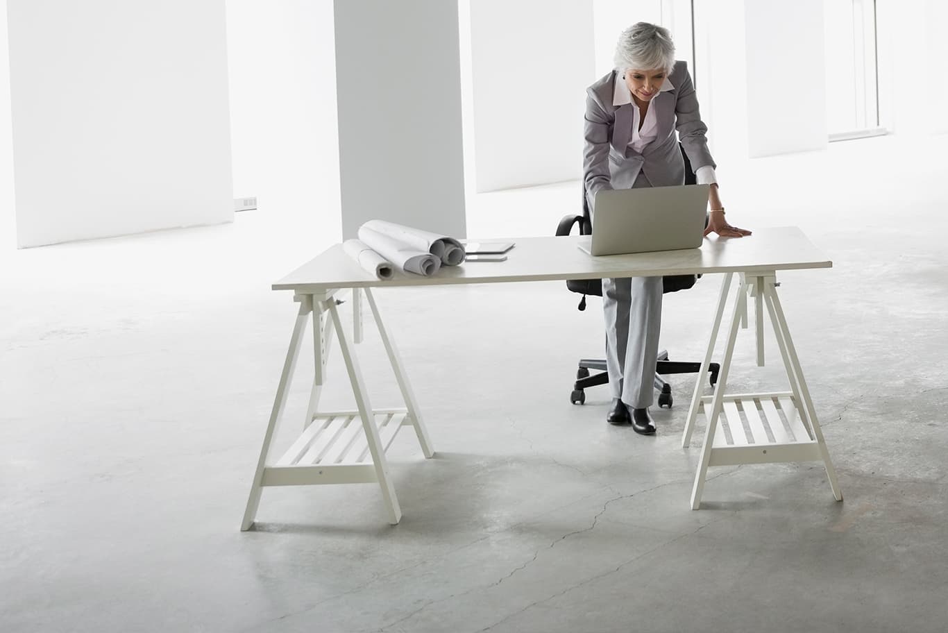 Elderly woman using computer