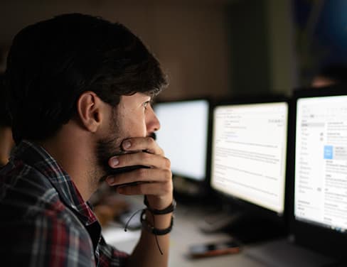 man looking at email