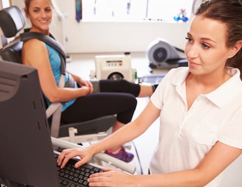 Nurse using desktop computer.