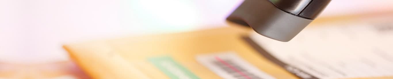 Employee working in mail room.