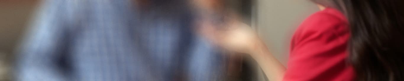 man and woman conversing