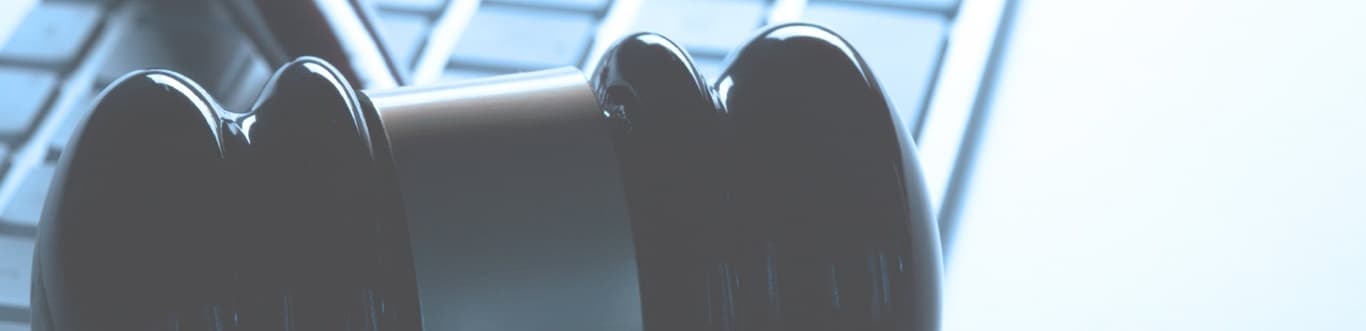 Gavel laying on keyboard